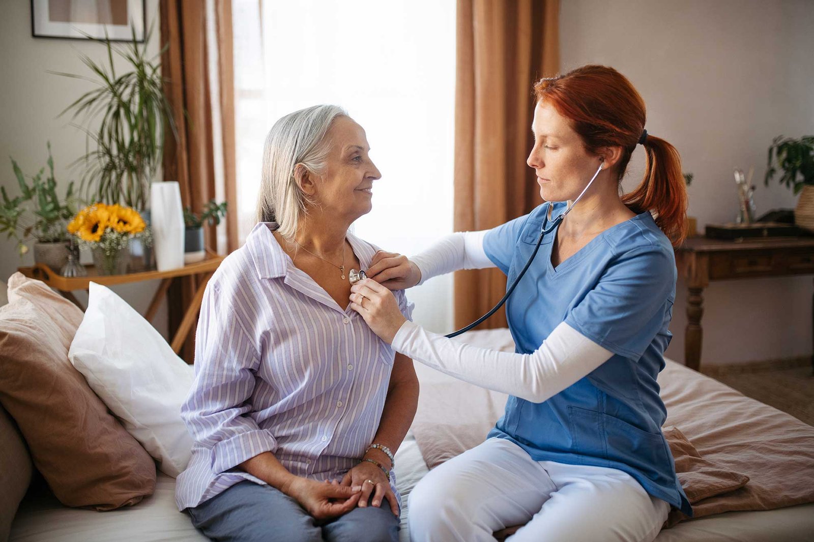 nurse-examining-senior-patient-with-stethoscope-at-2023-11-27-04-49-31-utc.jpg
